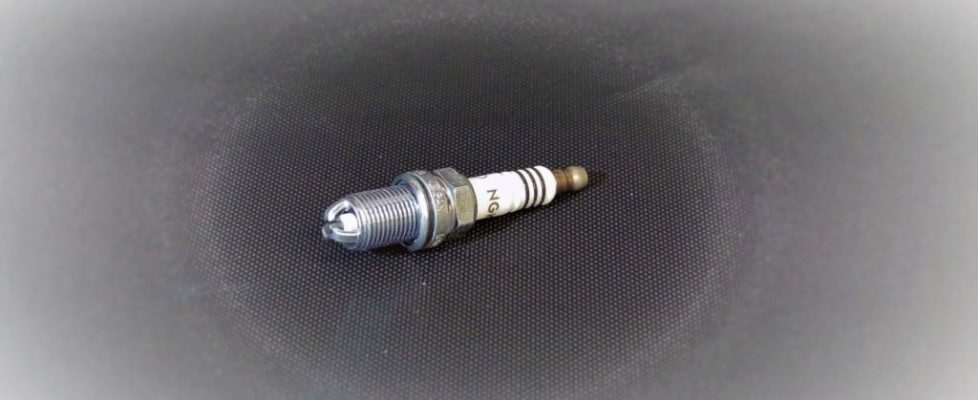 Spark plugs with ceramic components